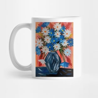 A beautiful bouquet of mixed flowers in a turquoise and blue and gold . Mug